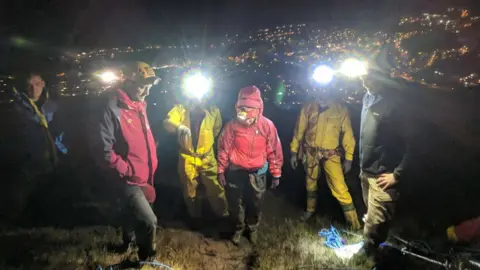 South and Mid Wales Cave Rescue Team Rescuers on Mynydd James in Blaina