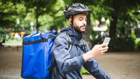 Getty Images Bicycle delivery rider