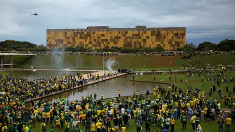 Reuters Protesters surrounding government buildings in Brasilia