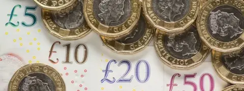 PA Media Pound notes and coins