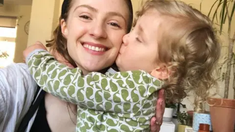 Family handout Andante Singer with her son Atticus