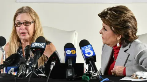 Getty Images Mamie Mitchell speaks during press conference, with Gloria Allred