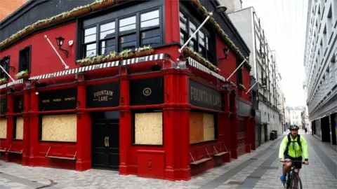 Reuters A pub closed in Belfast due to lockdown