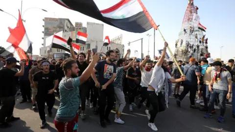 EPA Demonstrators take part in an anti-government protest in Baghdad, Iraq (25 May 2021)