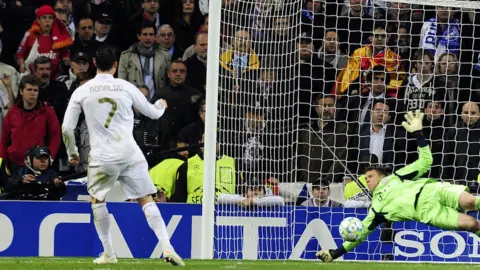 Getty Images Real Madrid player Ronaldo has his penalty saved by Bayern Munich keeper Manuel Neuer