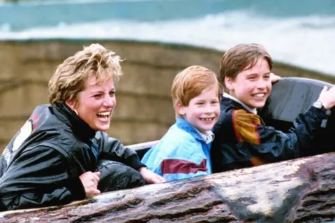 Duncan Raban/ PA Diana, Princess of Wales, with sons Prince William and Prince Harry during a visit to Thorpe Park amusement park in 1993