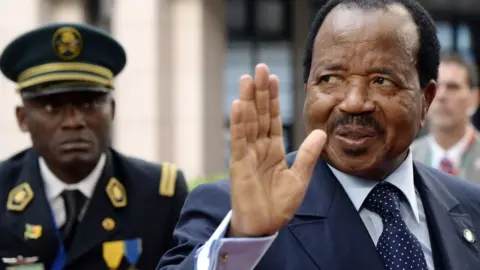 AFP President Paul Biya waves as he arrives for the second day of the 4th EU-Africa summit on April 3, 2014 at the EU Headquarters in Brussels