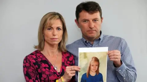 Reuters Kate and Gerry McCann pose with a computer generated image of how their missing daughter Madeleine might have looked in 2012