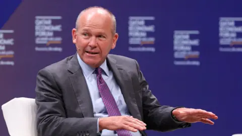 Bloomberg via Getty Images David Calhoun, chief executive officer of Boeing, speaks during a panel session at the Qatar Economic Forum in May 2023