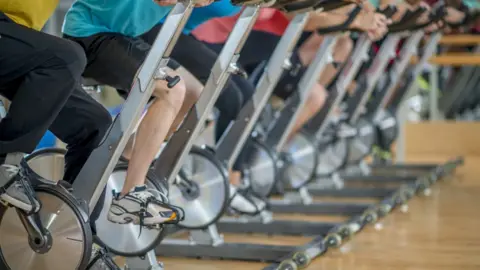 Yoga mat under online spin bike