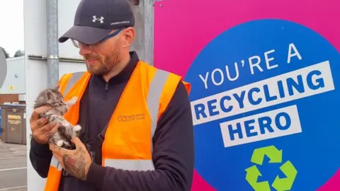 Staffordshire County Council Sam Ward, pictured with one of the kittens