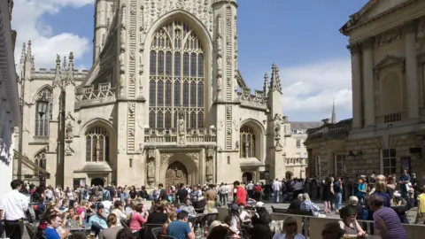 Getty Images Tourist crowds in the centre of Bath