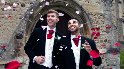 Getty Images Two grooms