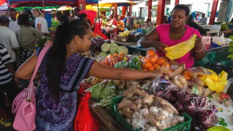 Locals shopping at the farmers' market in Victoria