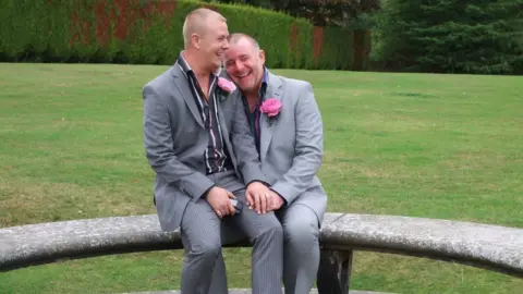 Family image Mark and Luke at their wedding