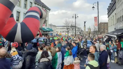 Large crowds gathered to walk the St Patrick's Day parade in Derry