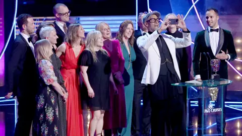 Getty Images he cast and crew of 'The Repair Shop: A Royal Visit', including Jay Blades (C), winners of the Daytime Award on stage during the 2023 BAFTA Television Awards with P&O Cruises, held at the Royal Festival Hall on May 14, 2023 in London, England