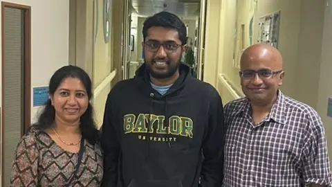 LAS Atul Rao with his mother Srividhya and father Ajay at the hospital he where his life was saved