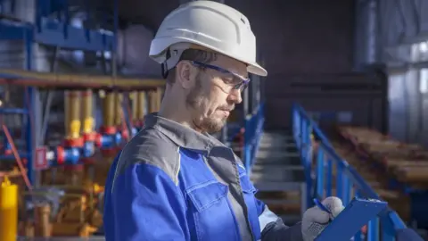 Getty Images Gas worker