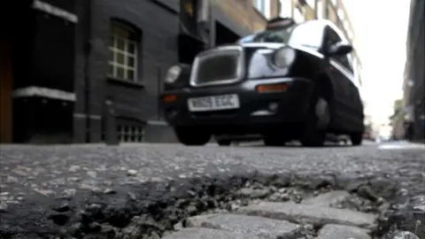 Getty Images Pothole in road