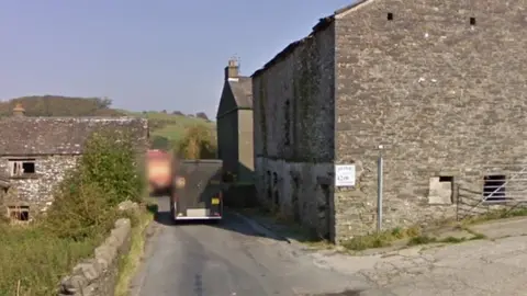 Google Vans passing the narrow section of the road