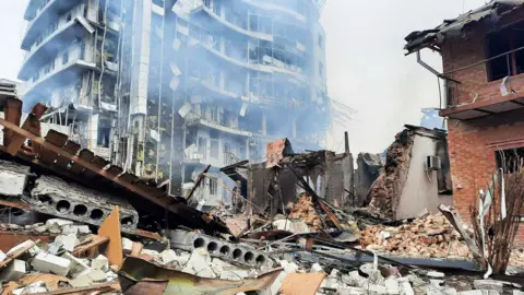 Getty Images Buildings in ruins in Kharkiv, 3 March