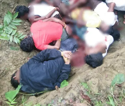 Handout The bodies of the Rohingya men in a mass grave