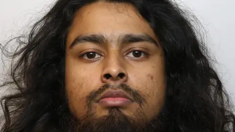 Wiltshire Police Mohammed Yusuf Ali in his custody mugshot facing the camera