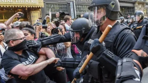 Reuters Police in Boston clash with protesters against a conservative rally, 19 August 2017