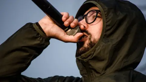 Getty Images Rapper Josep Miguel Arenas, known as Valtònyc, performs during a demonstration in Barcelona, 17 March 2018