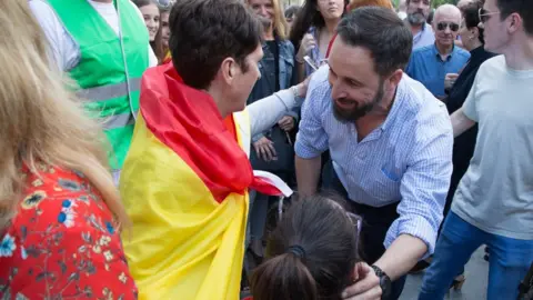 Getty Images Santiago Abascal, leader of Vox, seen greeting his supporters in Madrid in June 2018