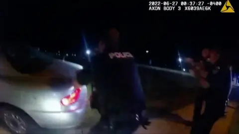 A frame from the Akron Police Department bodycam