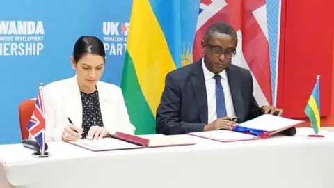 PA Media Home Secretary Priti Patel and Rwandan minister for foreign affairs and international co-operation, Vincent Biruta