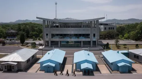 AFP/Getty Images A photo taken on 2 June 2017 shows a general view of the military demarcation line separating North and South Korea, from the northern side of the Joint Security Area (JSA) near Kaesong on the North Korean side of the border.