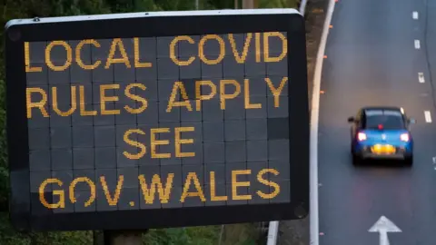 Getty Images Wales Covid rules sign