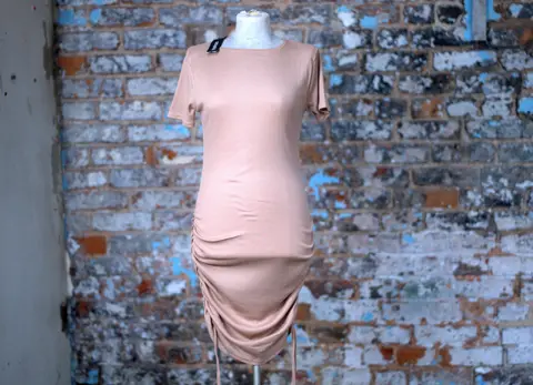 Brown dress on a mannequin