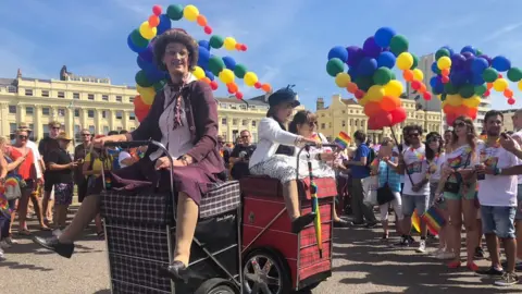 Revellers at the parade