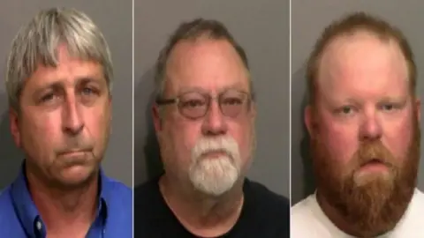 AFP/Getty Images From left to right: William Bryan, Gregory McMichael and Travis McMichael