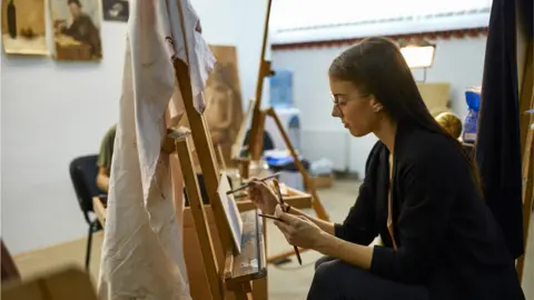 Getty Images Student painting