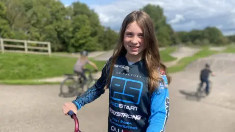 BBC Amelie on her bike