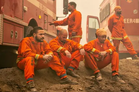 Getty Images Prisoners are recruited to fight wildfires every summer