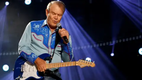 Reuters Glen Campbell performs during the Country Music Association (CMA) Music Festival in Nashville, Tennessee June 7, 2012