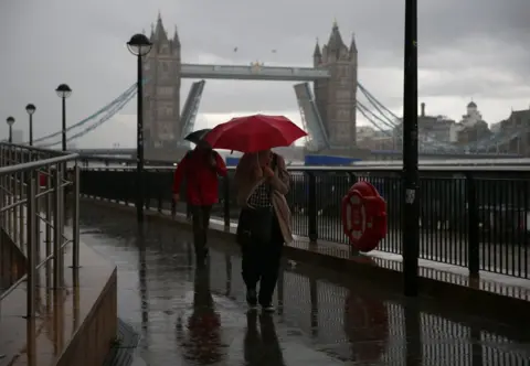 Hollie Adams / PA Media London's Tower Bridge is seen stuck open because of a technical fault, on 9 August 2021