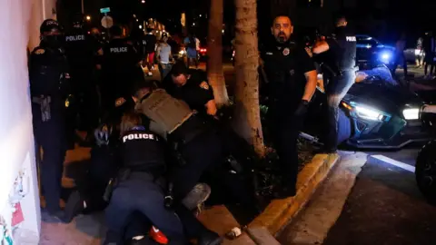 Reuters Police make arrests in Miami Beach