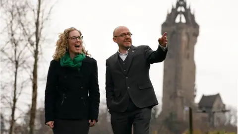 PA Media Lorna Slater and Patrick Harvie