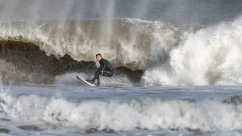 Nigel McFarland Surfers took advantage of the huge swells on the Irish coastline