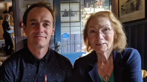 Neil Baker and his mother