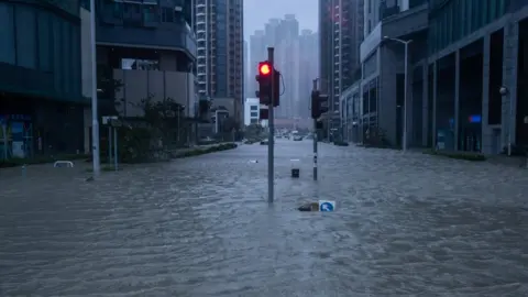 Getty Images A Hong Kong streets filled with knee-deep water