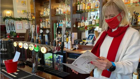 Anna Christopherson in her bar.