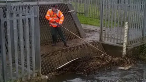 NRW Workers from NRW are clearing rivers to try and minimise flooding